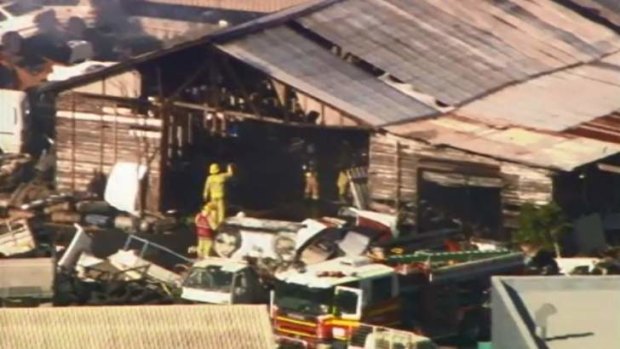 Fire crews at the site of a warehouse fire in Longlands Street, Woolloongabba.