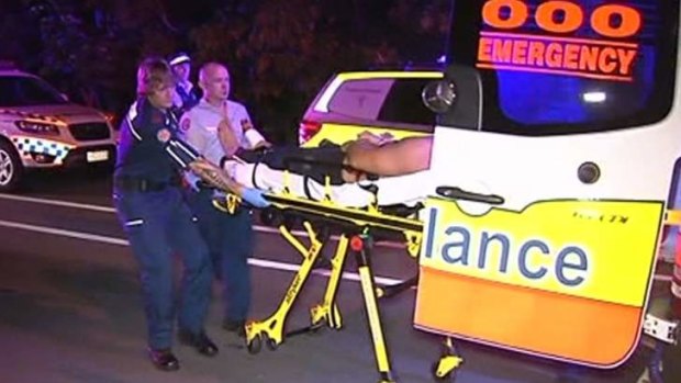 A veteran police officer and two thieves were taken to hospital after a shoot-out on the Gold Coast.
