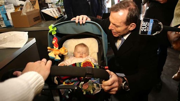 Prime Minister Tony Abbott concedes that he hasn't persuaded all on the merits of his paid parental levy policy but says he does not "break promises".