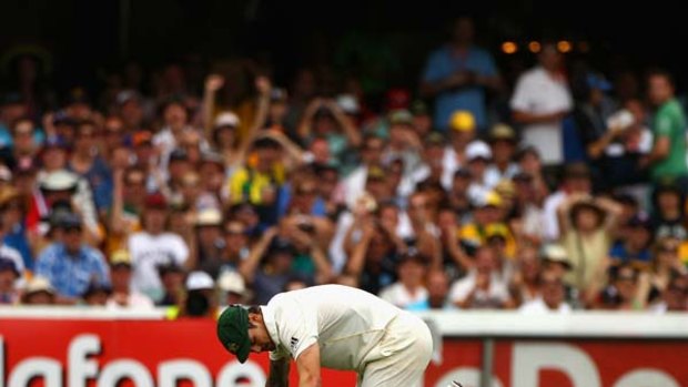 Doing it tough ... Mitchell Johnson at the Gabba yesterday.