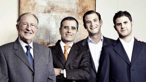 Raymond Weil (left) with son-in-law and company CEO Olivier Bernheim, and grandsons Elie and Pierre Bernheim, who are chief officers for the company.
