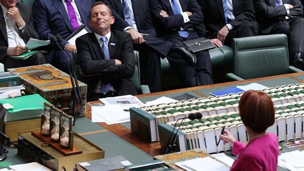 Opposition Leader Tony Abbott and Prime Minister Julia Gillard clash in parliament on Thursday.