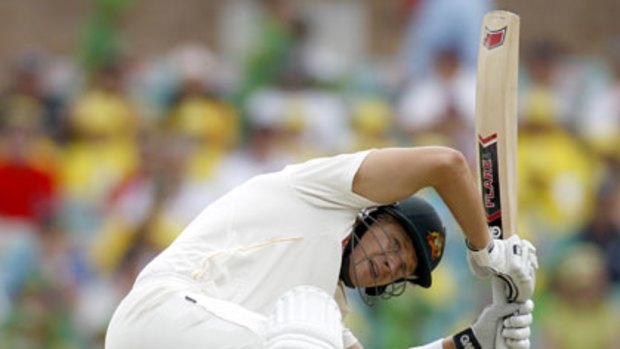 Let's do the twist ... Australia's Shane Watson shies from a close ball at the SCG yesterday.