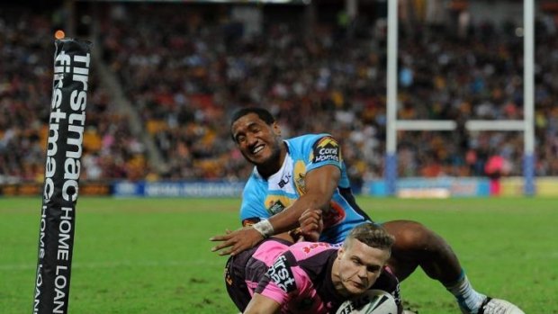 Good Cop: Brisbane winger Dale Copley goes over for the opening try.