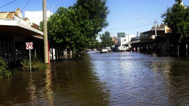 The main street of Charlton under floodwater.