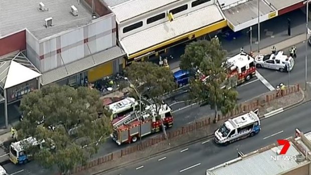 Emergency services outside the Commonwealth Bank in Springvale.