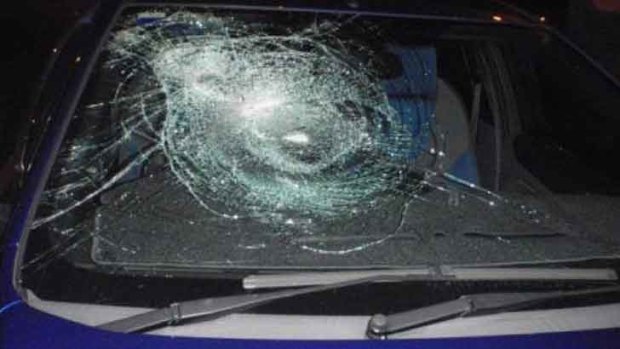 The damage caused by thrown rocks to a 54-year-old woman's car on Thursday.