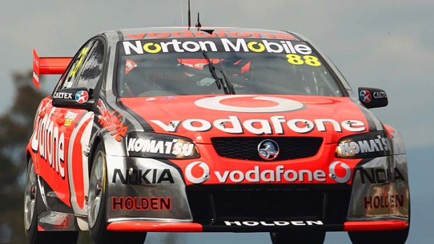 Jamie Whincup drives the #88 Team Vodafone Holden.