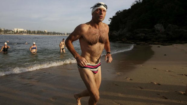 PM Tony Abbott at a charity ocean swim.