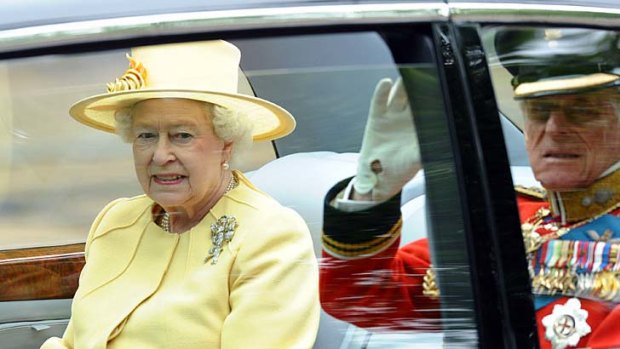 The Queen and the Duke of Edinburgh travel to Westminster Abbey for the royal wedding.