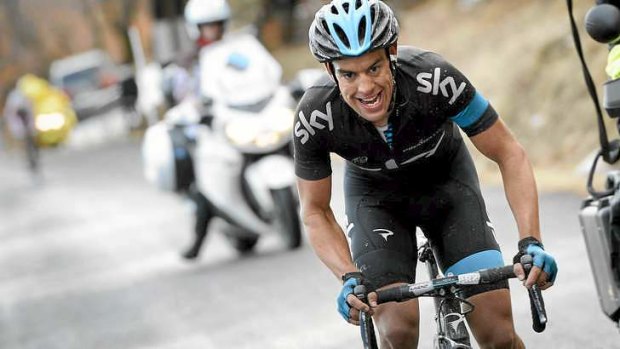 Richie Porte rides away from the field in the final kilometres.