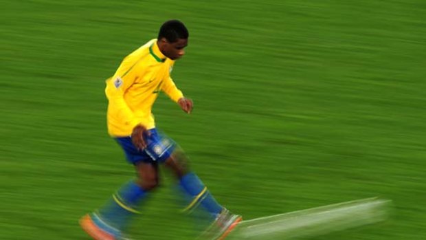 Juan of Brazil in action during the match against Chile at Ellis Park Stadium on June 28, 2010.