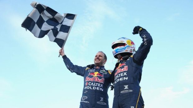 Paul Dumbrell and Jamie Whincup celebrate.