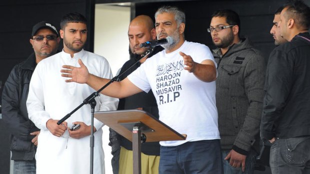 Tariq Jahan, whose son was killed last week during a riot in Birmingham along with two other men, pleads for peace at a rally on Sunday.
