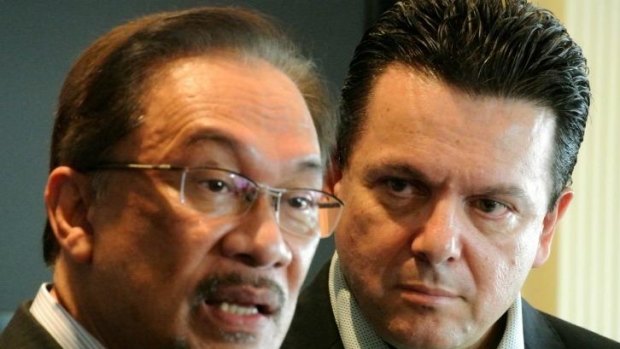 Malaysian opposition leader Anwar Ibrahim and independent Australian senator Nick Xenophon in Jakarta.