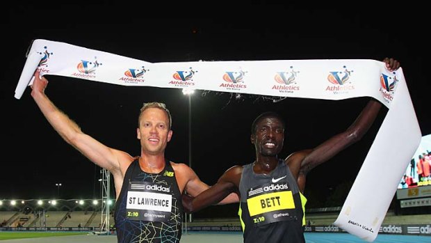 Dynamic duo: Ben St Lawrence (left) and winner Emmanuel Bett pose after the Zatopek race on Saturday night.