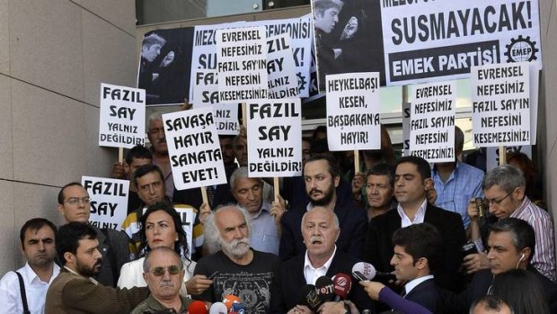 Free speech ... supporters of Fazil Say demonstrate in front of the courthouse in Istanbul.