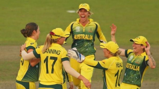 Rene Farrell, left, celebrates with teammates after Australia's win over the West Indies?