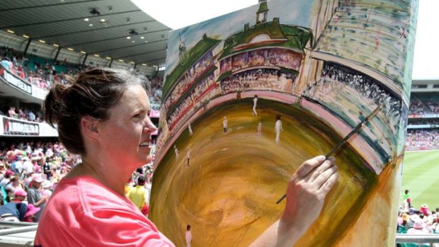 Making a stand &#8230; Helen Alker, one of 12 artists painting scenes from the SCG's 100th Test match.