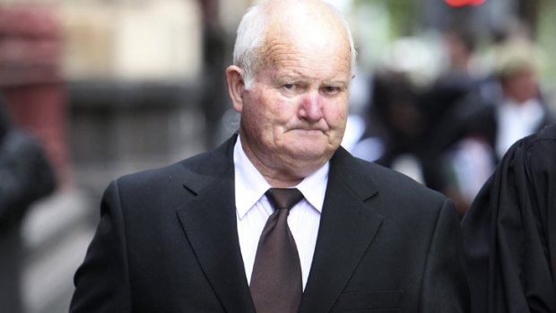 John Vincent McDonald leaves the Supreme Court in 2011.