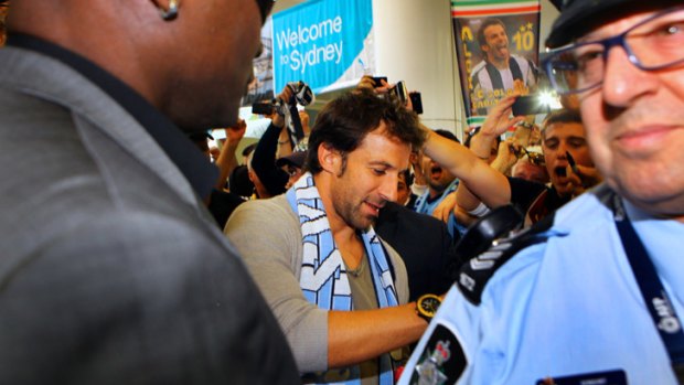 Standing out in the crowd: Alessandro Del Piero arrives at Sydney Airport yesterday.