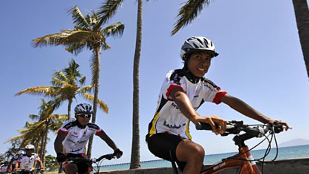 No easy ride... members of the national team, including Francelina Marques Cabal (right), train in Dili.