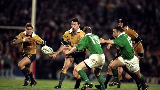 Past masters: Joe Roff and Tim Horan combine during a Test against Ireland in 1999.