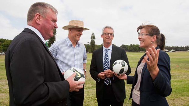 Political football ... Asian Cup boss Michael Brown with Peter Garrett, David Gallop and Kate Lundy.