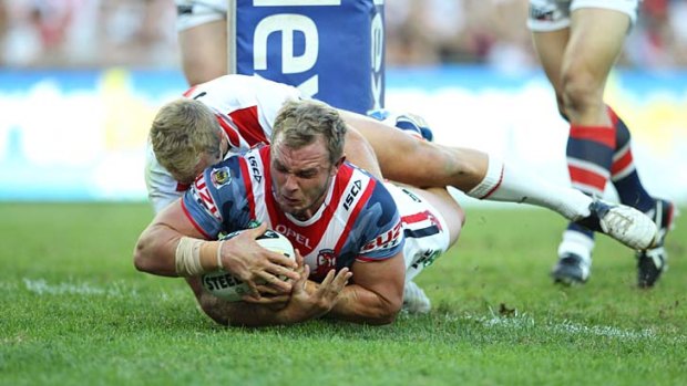 Martin Kennedy scores for the Roosters.