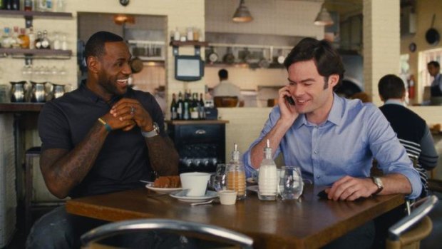 LeBron James, left, as himself, and Bill Hader as his best friend, Aaron.