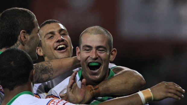 Origin calculations &#8230; Raiders five-eighth Terry Campese celebrates his try on Monday night.