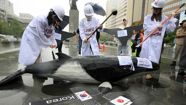 South Korean environmentalists protest in Seoul against the government's plan to introduce whaling