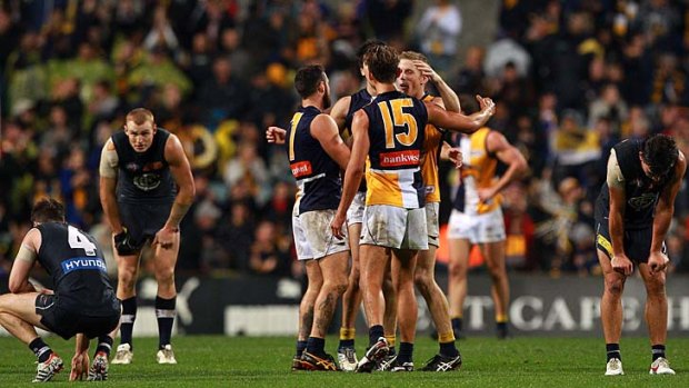 Fresh legs? West Coast players celebrate beating Carlton, after having a bye the previous week.