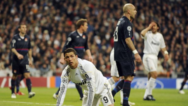 Time to exit ... Real Madrid's Cristiano Ronaldo reacts during the Champions League clash against Lyon.