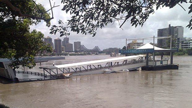 The flooded Mowbray Park CityCat terminal, pictured as the Brisbane River level rose on January 12, escaped major damage.