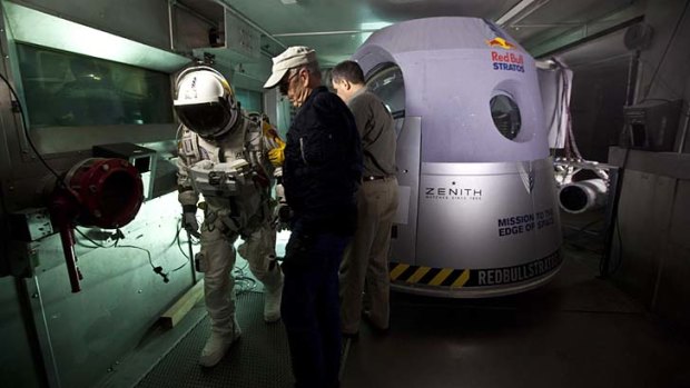 Felix Baumgartner steps out of the capsule after a test at Brooks.