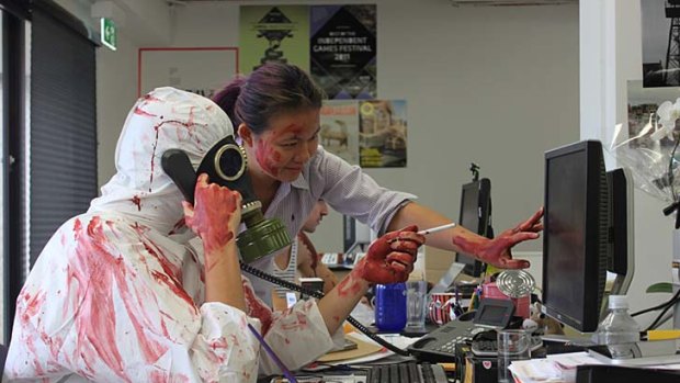 Caden Adam and Vivian Koh from the Zombie Apocalypse design team.