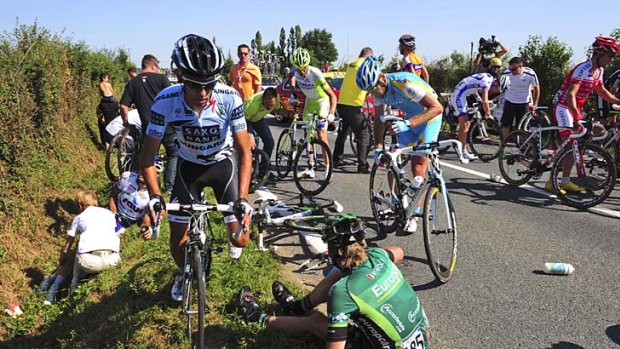 With less than nine kilometres to go until the finish line, a huge pileup claimed many of the race favourites including reigning Tour de France champion Alberto Contador.