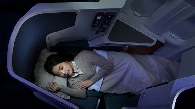 Rugby second-rowers and basketball champions rejoice: in full flat-bed mode, Cathay's new business class seats are roomy and an extension increases seat width for additional hip support.