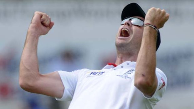 England's James Anderson celebrates catching Mike Hussey.