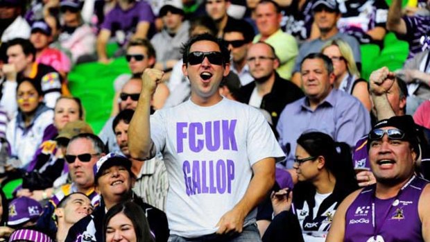 A Storm fan makes his feelings clear at yesterday's game against the Broncos in Melbourne.