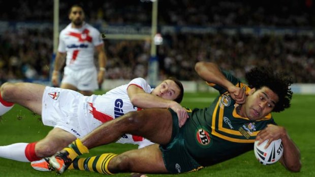 Try time ... Australia's Sam Thaiday scores the opening try of the Four Nations final.