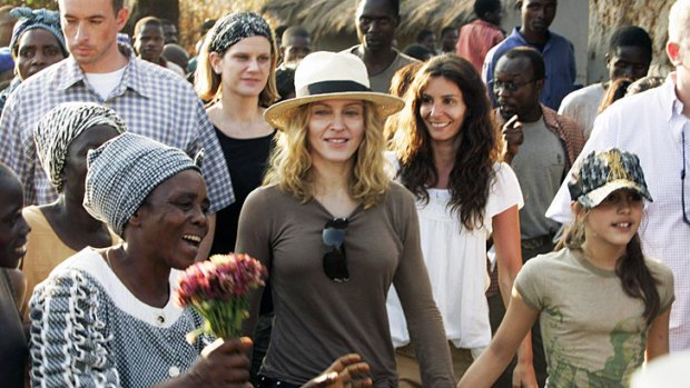 Madonna ...   in Malawi  on the adoption trail.