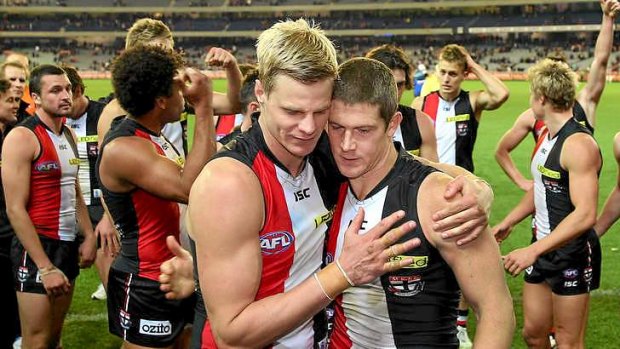 Nick Dal Santo (right) hugs his captain and teammate, Nick Riewoldt, after the pair played their 250th games last month.