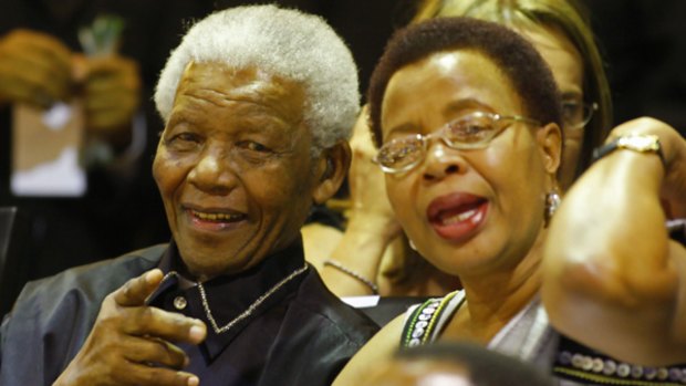 Former South African president Nelson Mandela with his wife Graca Machel.