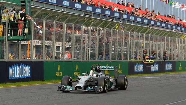 Mercedes driver Nico Rosberg of Germany crosses the finish line to win the Formula One Australian Grand Prix on Sunday.