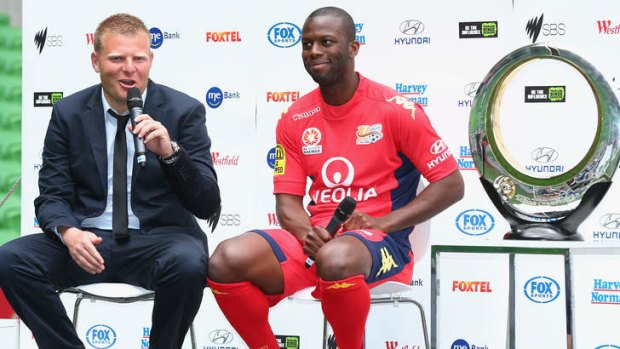 Adelaide United coach Josep Gombau and Bruce Djite at the A-League season launch in Melbourne.