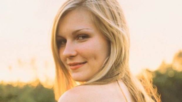 Kirsten Dunst portraying a high school adolescent in Sofia Coppola's the Virgin Suicides.