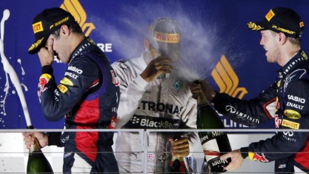 On the podium: Daniel Ricciardo, left, finished third.