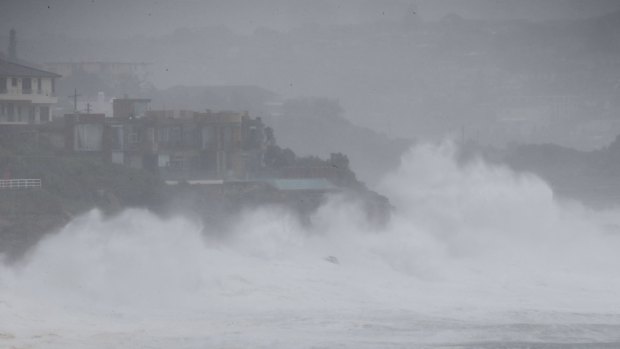 Huge waves whipped up by the storm smash into Lurline Bay, Sydney. 